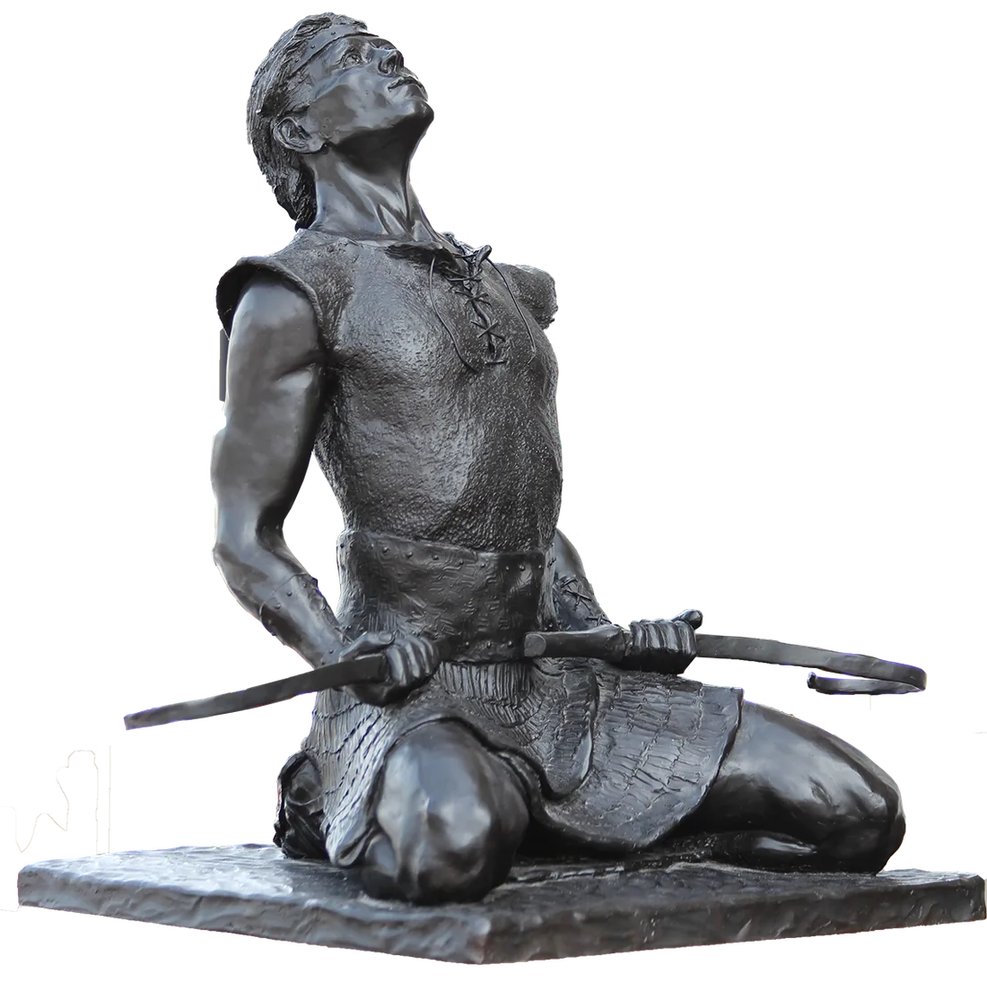 Bronze sculpture of a kneeling figure looking heavenward